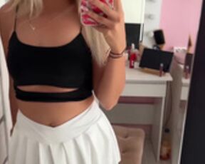 Sexy Polish slut shows her legs in white miniskirt