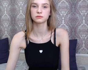 Barely legal Russian teen plays with her fine body